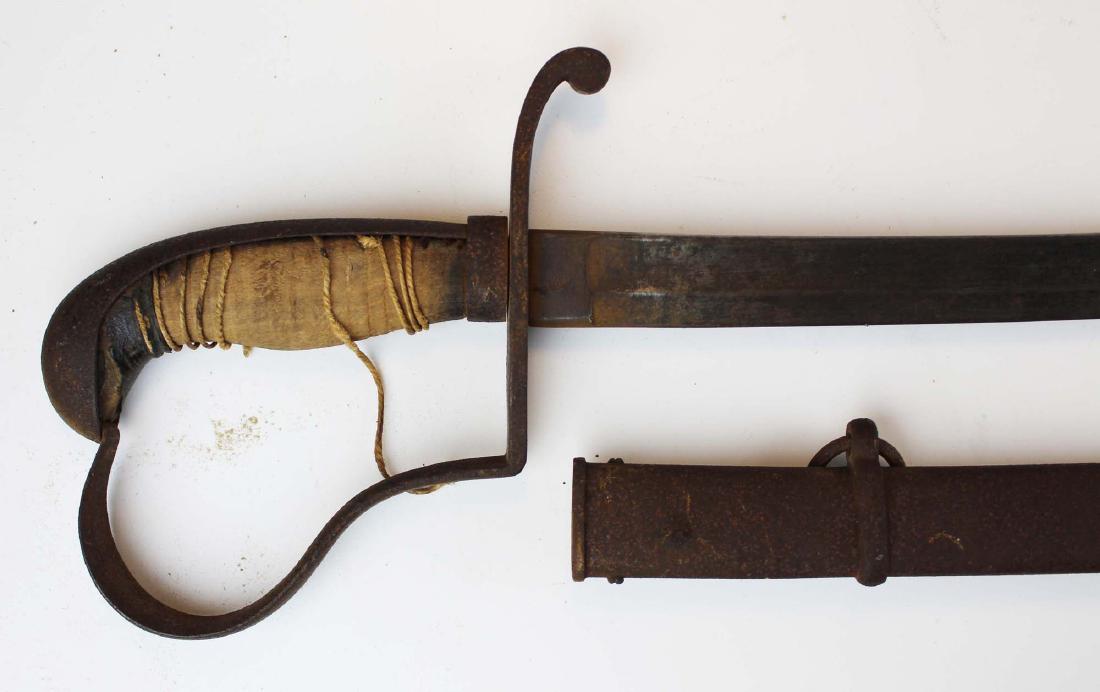 19th c Continental saber: 19th c German/ Prussian cavalry saber- blade marked with a Vienna, Austria beehive mark, with steel scabbard, missing grips & wrap on handles, overall length 38"