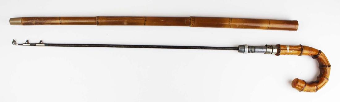 Metamorphic novilty cane / telescopic fishing rod: Novilty or gadget cane with telescopic medal spin fishing rod in side. Bamboo exterior.