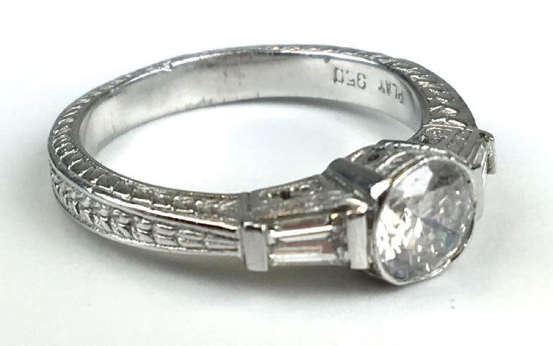 Platinum and diamond engagement ring. (1 of 3)