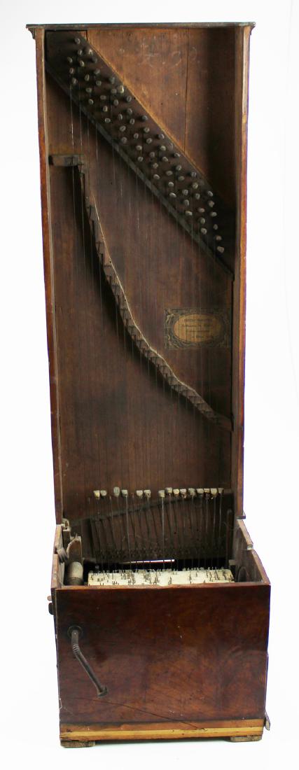 1836 Pietro Volonti hand crank cob organ: 1836 Pietro Volonte paper labeled hand crank cob organ, ht 34" overall width 10", length of cob 7 1/4", diameter of cob 6 1/4"