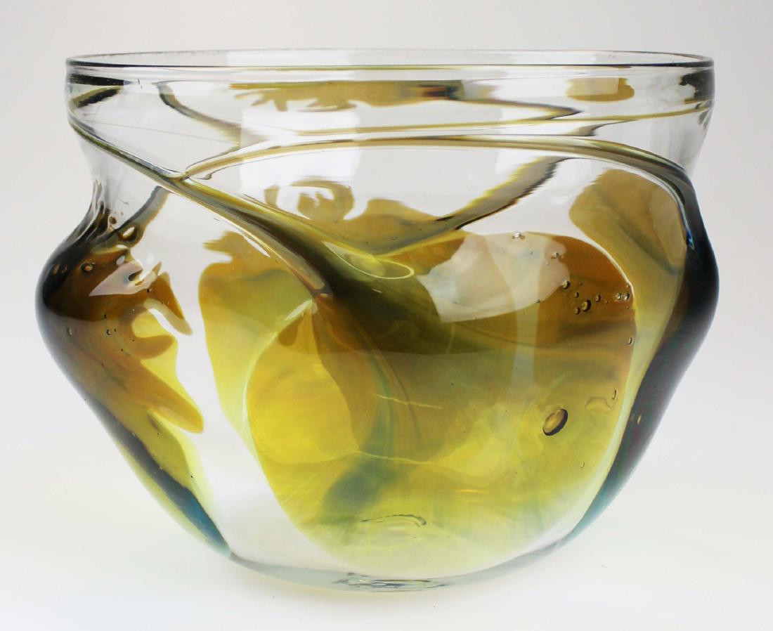 Peter Bramhall Bridgewater, VT art glass bowl: Peter Bramhall Bridgewater, VT art glass bowl signed "Bramhall 10/2/85" with olive green and soft blue iridescent leaf form motifs 7" x 9"