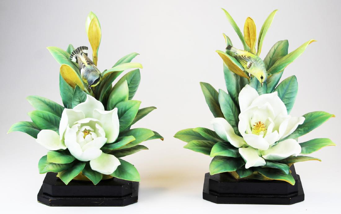 Pr. Royal Worcester Dorothy Doughty birds: Pair of ca. 1950 Royal Worcester Dorothy Doughty "Magnolia Warblers" artisan hand painted bone china porcelain birds on Magnolia botanical sculptures #2729, #4130, on ebonized wooden bases -each with 