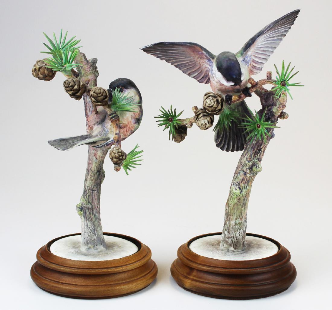 Pr. Royal Worcester Dorothy Doughty birds: Pair of ca. 1950 Royal Worcester Dorothy Doughty "Chickadee" (penthestes atricaplillus atricapillus) artisan hand painted bone china porcelain birds on pine tree bough sculptures, inset in turned roun