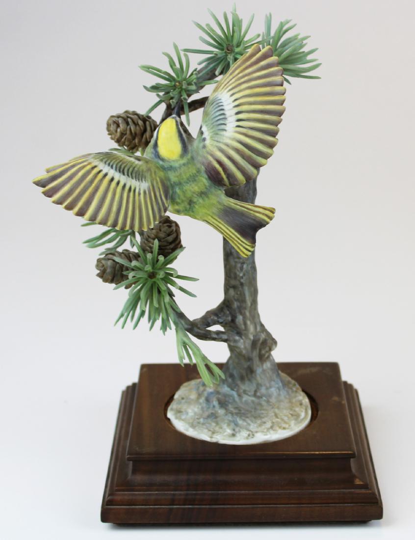 Royal Worcester Dorothy Doughty bird figure: 1973 Royal Worcester Estate of Dorothy Doughty "Gold Crest and Larch" (regulus cristatus) artisan hand painted bone china porcelain bird on pine tree bough sculpture, No. 92. inset in walnut base 8.25