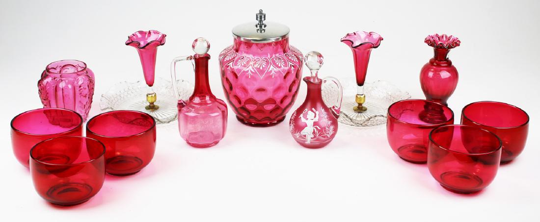 13 pieces Victorian cranberry glass: 13 pieces Victorian cranberry glass including set of 6 finger bowls, PR cranberry & clear tray epergne's, Mary Gregory cruet, coin spot enamel decorated bisquet jar, cruet, & two vases.