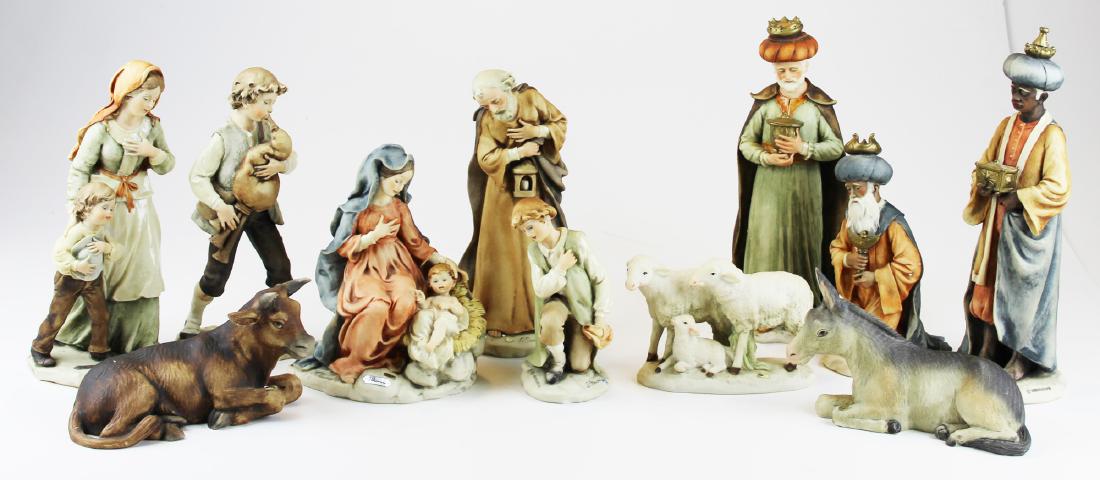 Giuseppe Armani Capodimonte Nativity set: Giuseppe Armani Capodimonte contemporary artisan hand-painted 11pc. Nativity set including Madonna and Child, St. Joseph, 3 wisemen, piper boy, shepherd boy, onlooking peasant woman and child, ox, don
