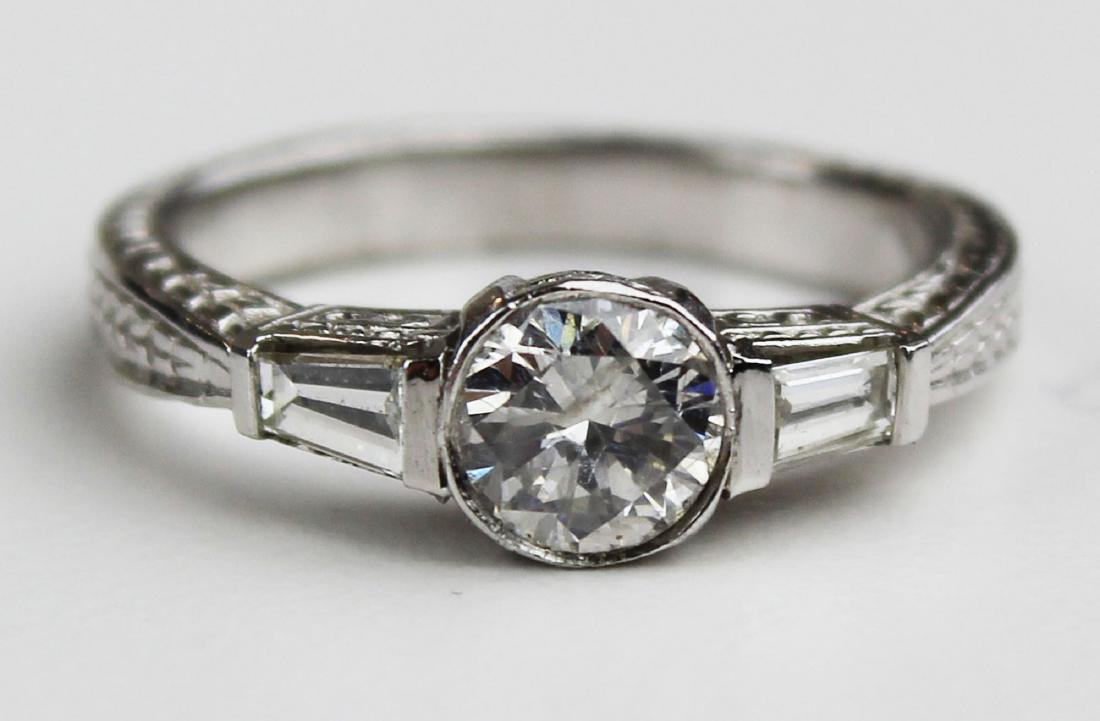 Diamond and platinum engagement ring (1 of 7)