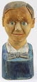 early 20th c folk art wooden bust of boy