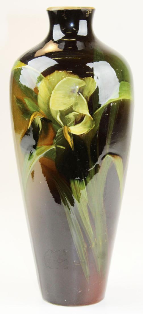 Louwelsa Weller art pottery vase with iris: Louwelsa Weller Arts and Crafts era art pottery vase decorated with iris, artist signed "L.M." (Lillie Mitchell) 13" x 5" -rim has been ground down to remove damage, base chip
