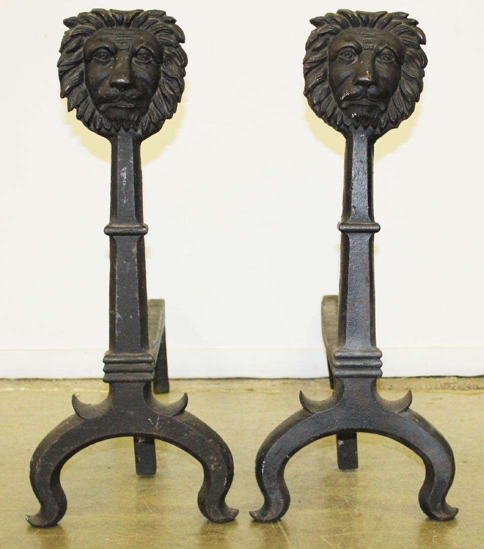 early 20th c cast iron lion's face andirons: early 20th c cast iron lion's face andirons, ht 28 1/2"