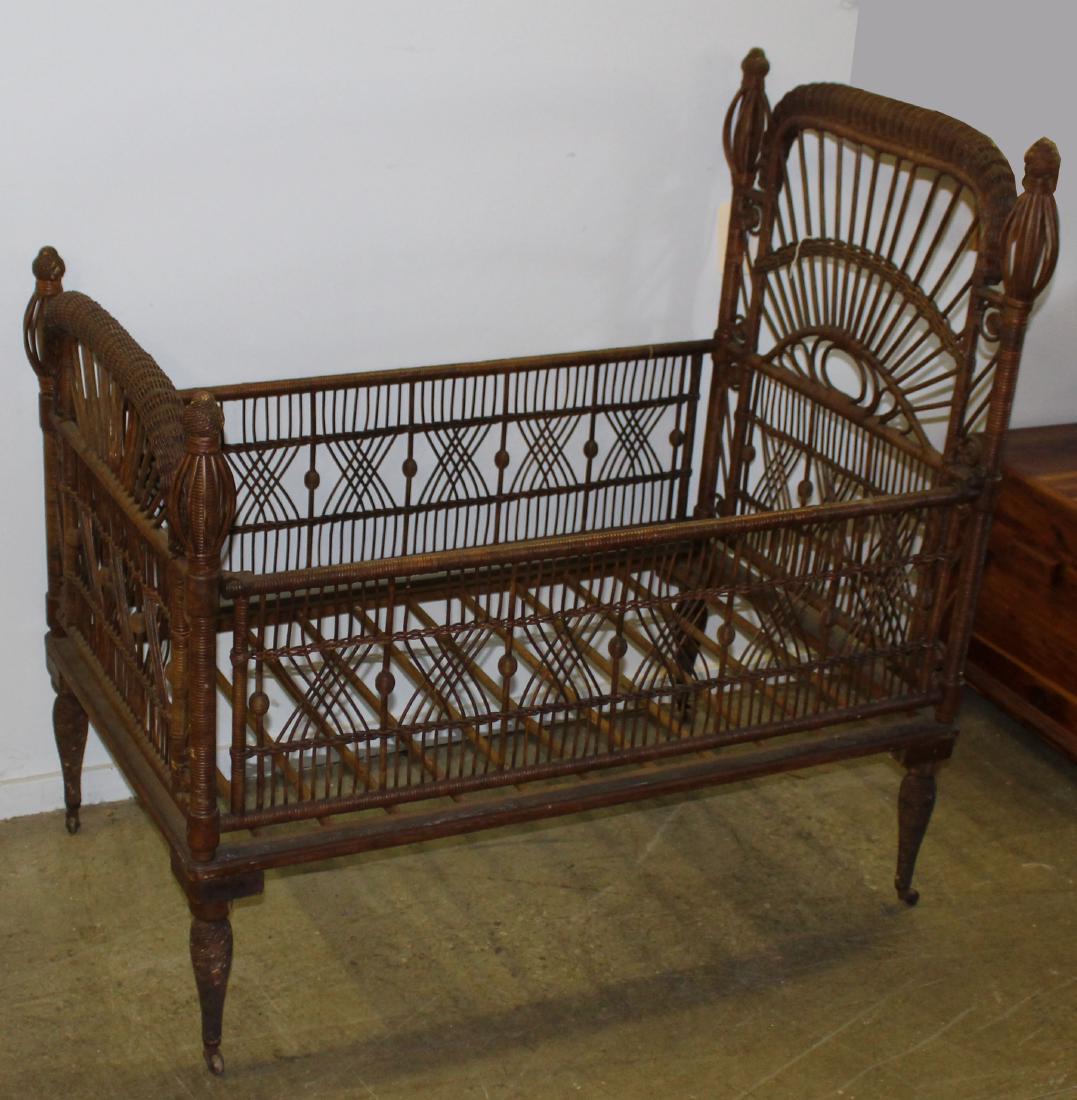 19th c wicker youth bed: Rare late 19th wicker youth bed in original surface, probably Heywood Wakefield. 31"w x 4'l x 49"h