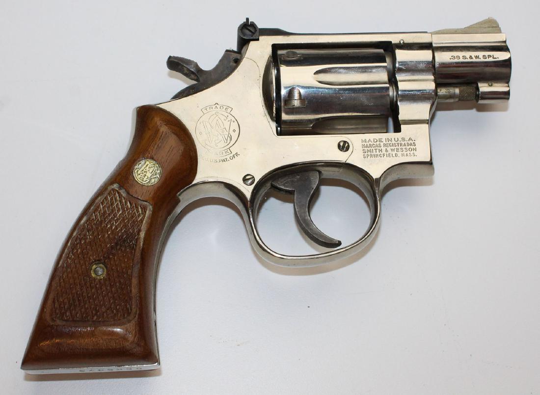 Smith and Wesson Model 15-4 Revolver: Smith and Wesson Model 15-4 Revolver chambered in .38 S&W SPL snub nose barrel Nickel finish SN# 96K5373 This firearm is to be sold in accordance with Federal Law. Buyer must pass NCIS background chec