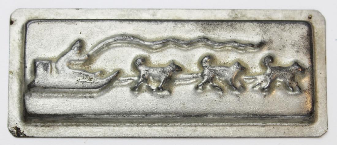 Grenfell Labrador Industries chocolate mold: attributed Grenfell Labrador Industries dog sled tin chocolate mold, length 4 3/4"