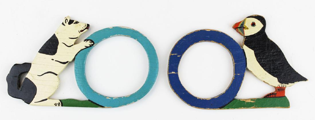 2 Grenfell Labrador Industries napkin rings: two Grenfell Labrador Industries napkin rings, length 3 3/4" to 4"