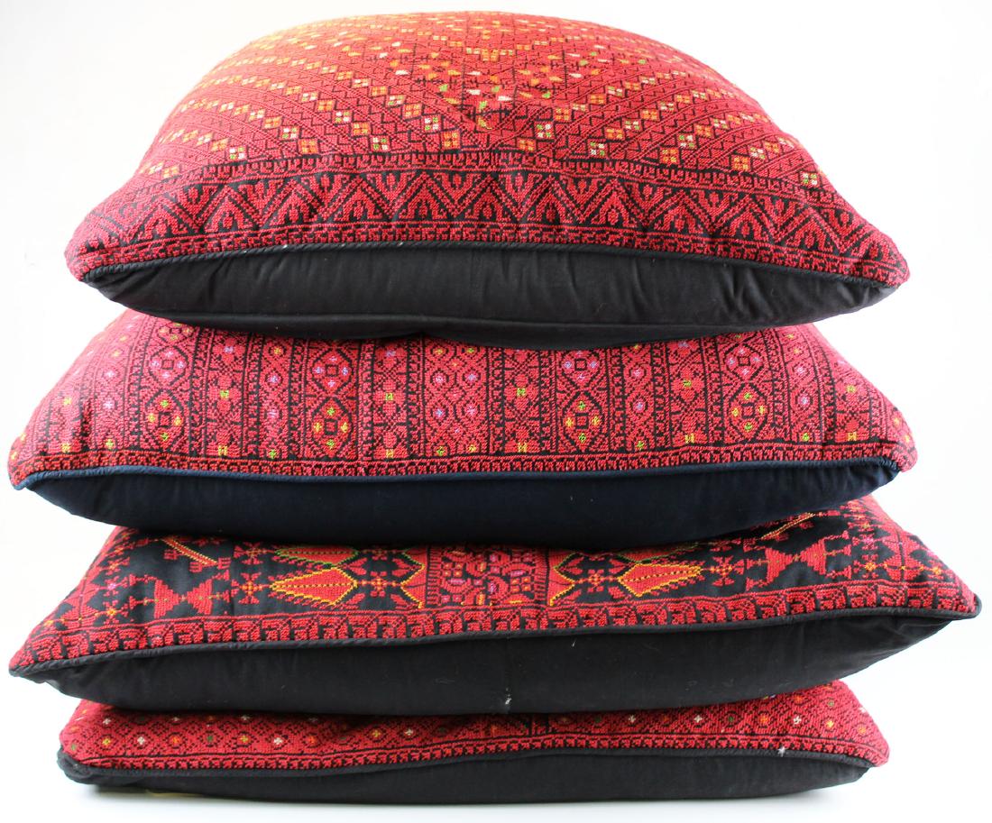 4 Jordanian embroidered oversized down pillows: 4 excellent oversized down throw pillows with intricate red on black cross stitched decoration embroidered by Jordanian women as a cottage industry to support education efforts 30" x 30"
