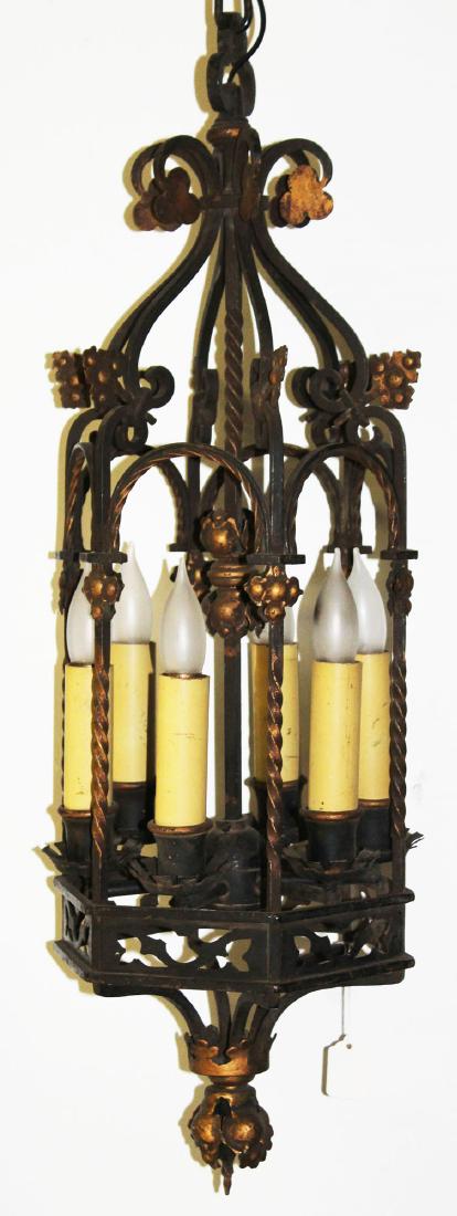 1920's Spanish Revival wrought iron chandelier: 1920's Spanish Revival wrought iron lantern form pendant entry hall chandelier with 6 candle lights 76" x 9"