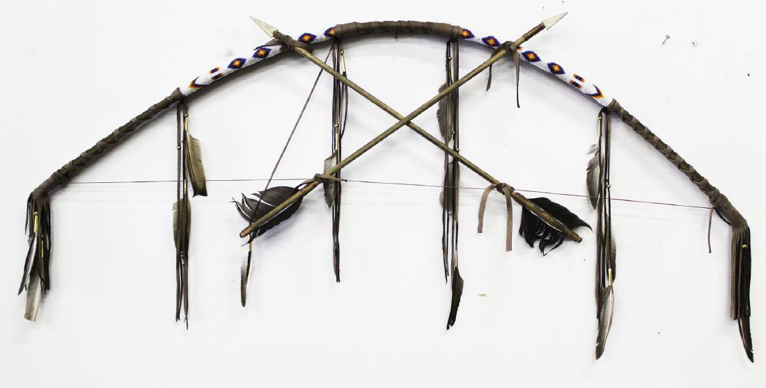 contemporary Plains Indian beadwork bow: contemporary Plains Indian beadwork bow, length 47"