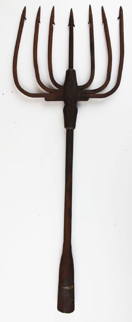 Eel Spear: Late 19th early 20th century Eel spear marked with Arrow motif most likely Onieda manufactured 21" long seven tines. Overall good condition