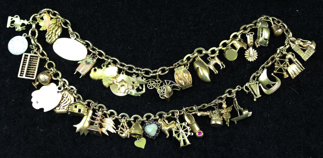 Gold charm necklace with 51 charms: 14k yellow gold charm necklace or 3 charm bracelets with 51 charms. 7 charms are loose. 5 that are not gold. Majority are 14k or unmarked gold. Total weight 174 grams (not including 5 non gold charms)