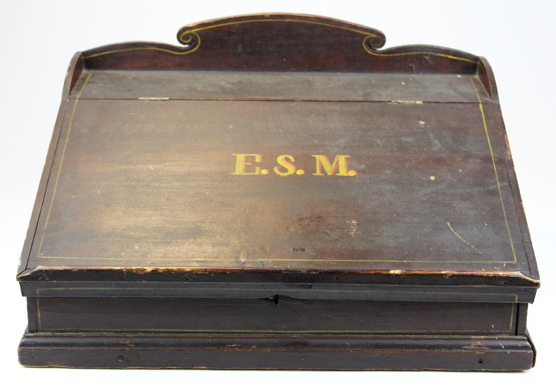 mid 19th c NE lap desk in old paint: mid 19th c New England lap desk in old paint with pin striping, initialed E S M in shadowed letters, multi-drawer interior, slanted lid, lift top, square nail construction, 21" x 17" x 10"