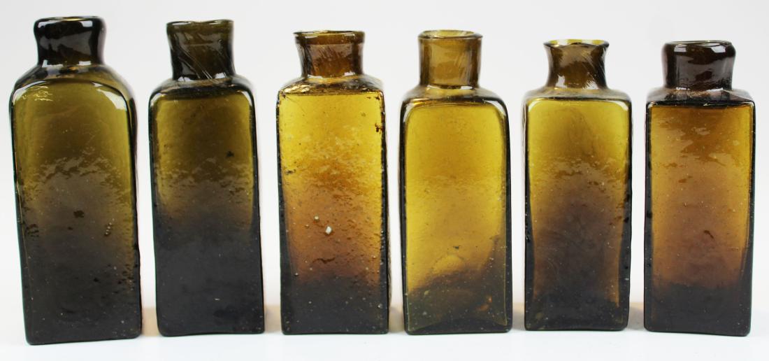 six mid 19th c open pontil blacking bottles (1 of 9)