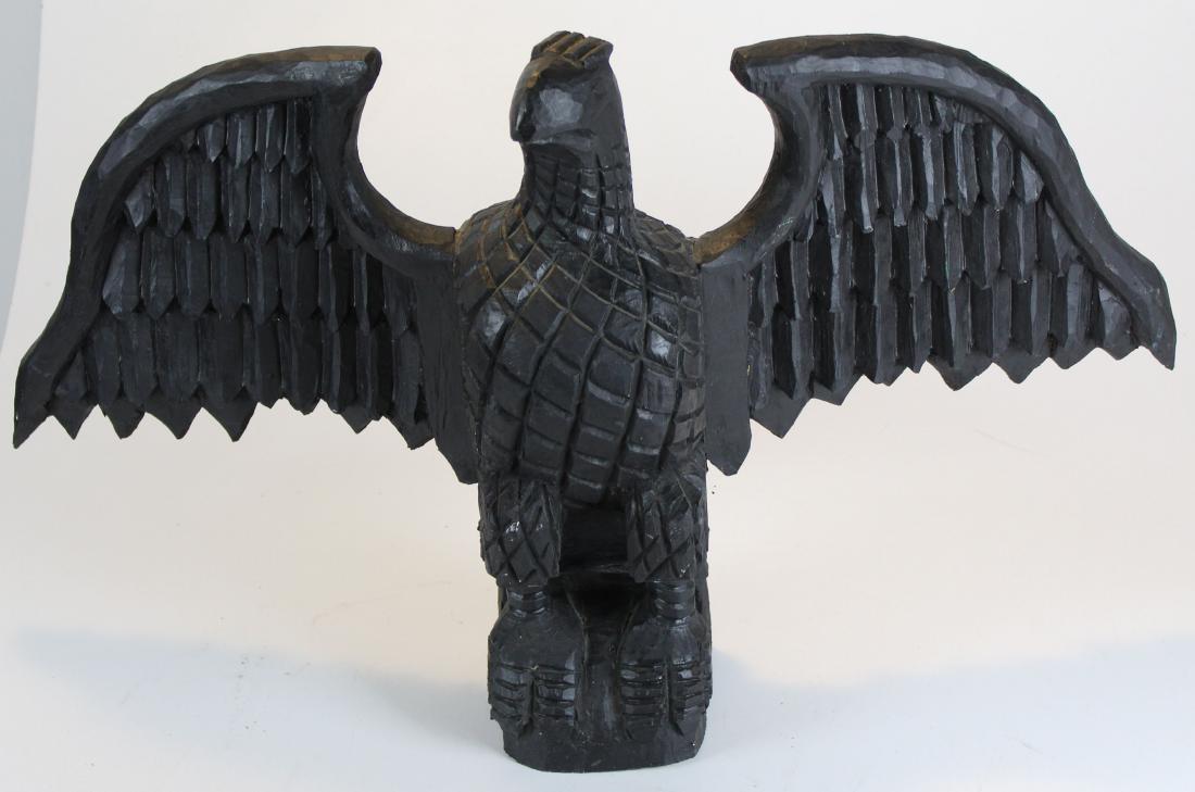 20th c carved wooden eagle in black paint (1 of 1)
