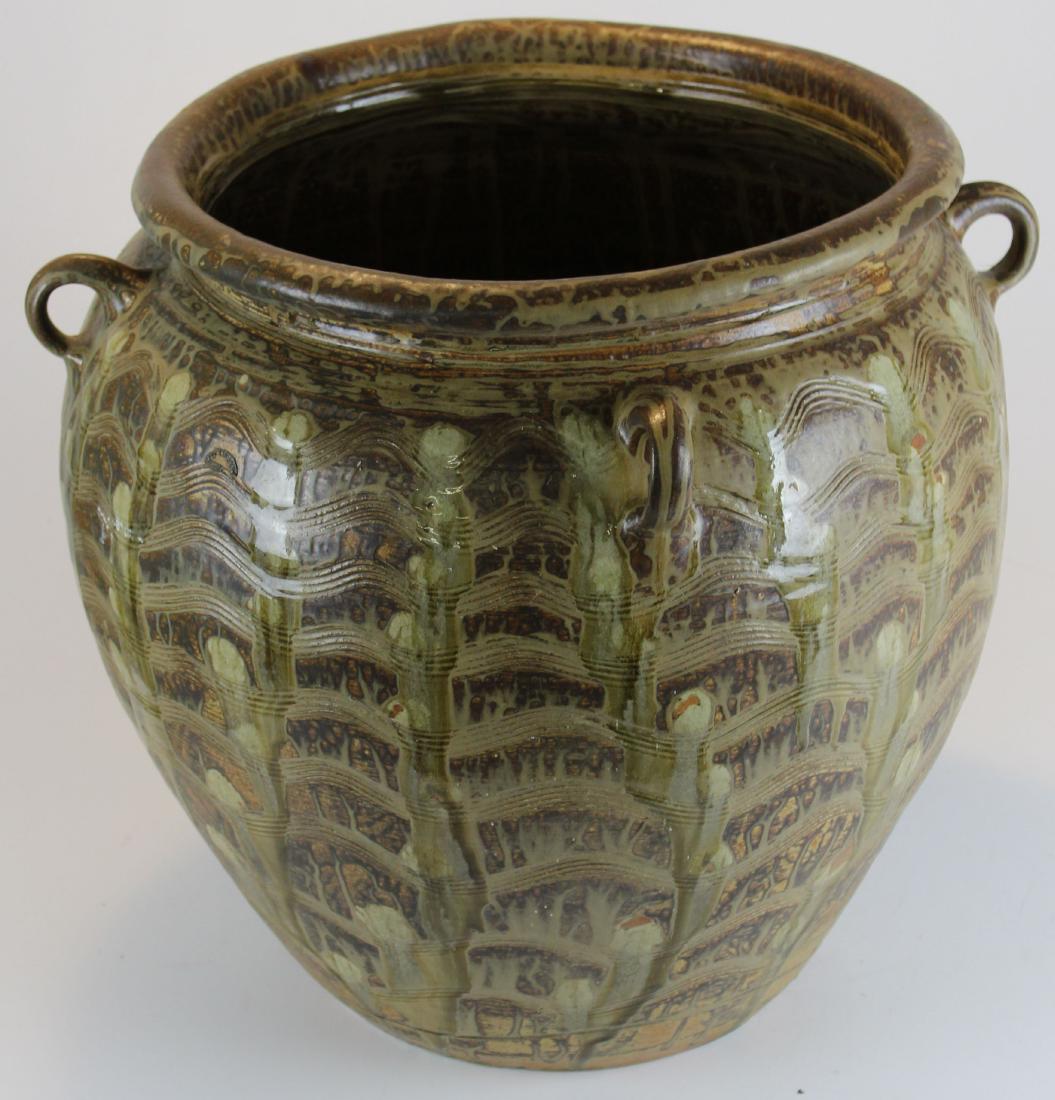 large Asian storage jar pottery vessel