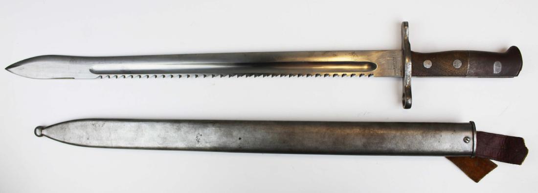 WWI Swiss sawback bayonet: WWI Swiss model 1914 pioneer sawback bayonet (issued with the Schmidt-Rubin Model 1911 carbine), Elsener Schwyz, blade length 18 7/8", overall length 24", with scabbard