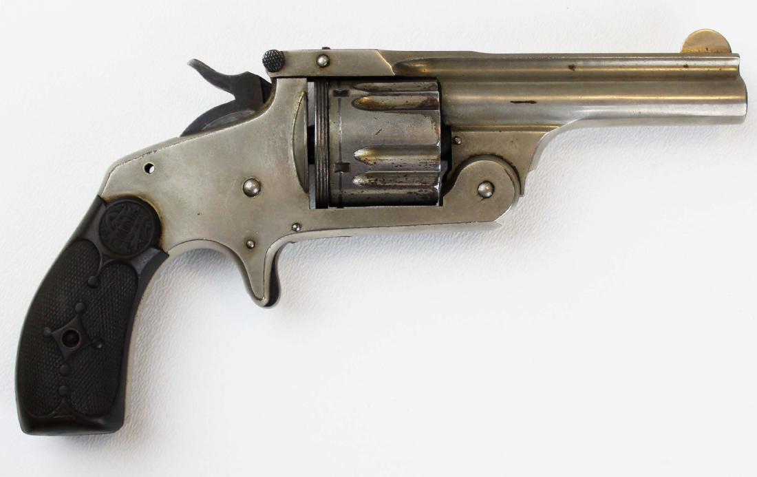 1888 American Arms Co .38 cal revolver: 1888 American Arms Co., Boston .38 cal center fire top break revolver, 5 shot cylinder, serial number 19015, overall length 8 1/2"