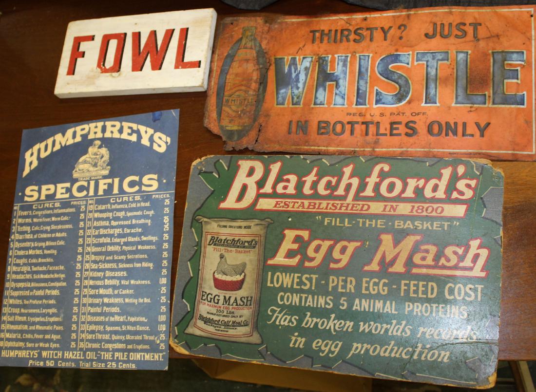 Four signs: four early/ mid 20th c signs- Wood and polychrome FOWL sign 6 x 11", cardboard Humphries specifics sign 16 x 12", Card board Blatchford's Egg Mash 12 x 17" , Tin Thirsty? Just Whistle sign as found 9.