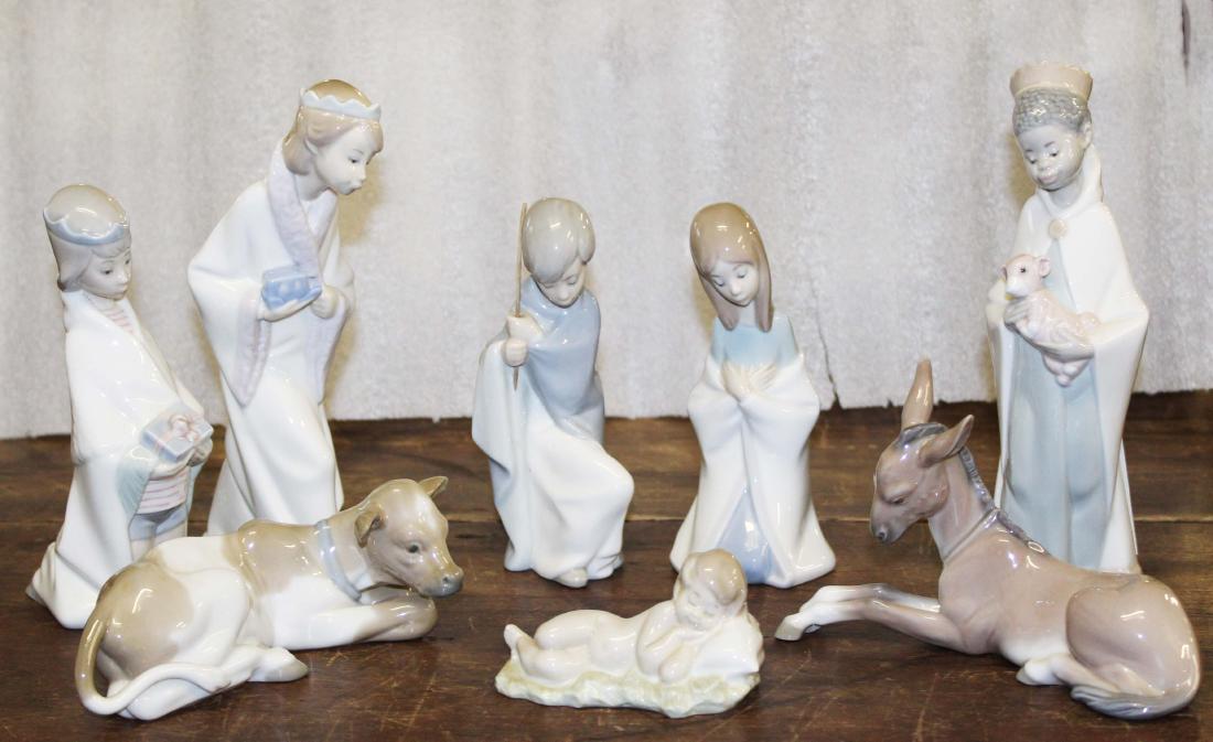 Lladro Spanish porcelain 8 pc. Nativity set: Lladro Spanish porcelain 8 pc. Nativity set consisting of Mary, Joseph, infant Christ, 3 kings, cow, donkey ht. 2" - 8.5"
