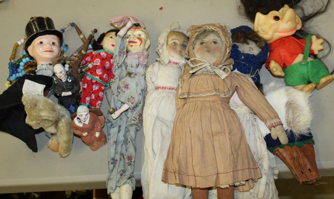 Lot of Dolls: Lot of dolls and puppets including Charlie McCarthy, Papier Mache Nodders, Henry wall plaque, Three Cloth dolls