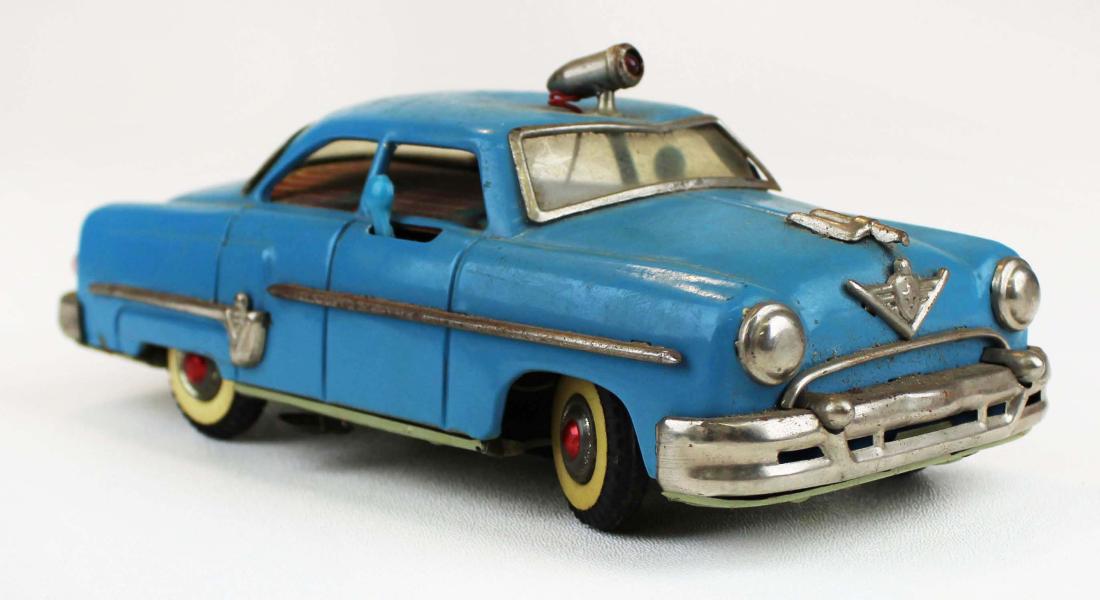 1950's Mizuno battery operated police car: 1950's Mizuno Japanese tin litho battery operated police car, excellent uncorroded battery box, top slightly dented around top light, length 8 1/4"