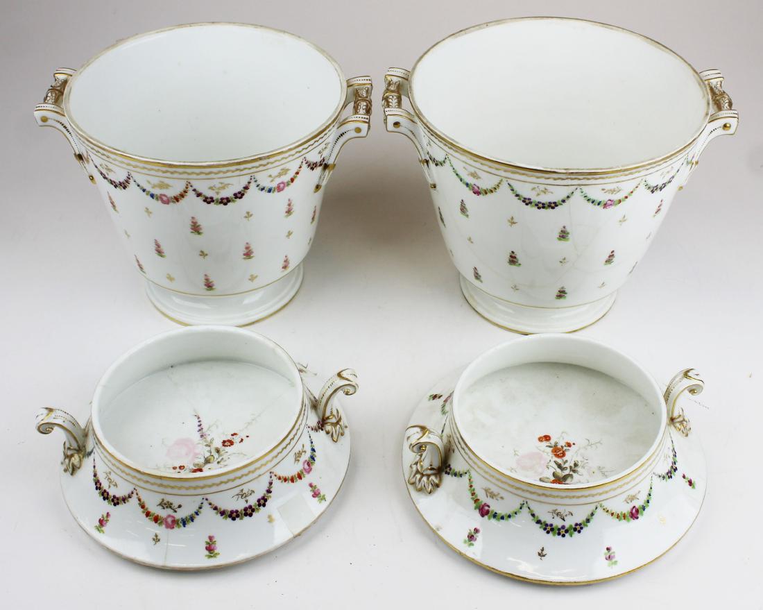 pair of 19th c. Paris Porcelain ice buckets: pair of 19th c. Paris Porcelain ice buckets with recessed lids for serving, decorated with Dresden style hand painted floral sprays and festoons 9.5" x 9"-some cracks, repairs and restorations to hand