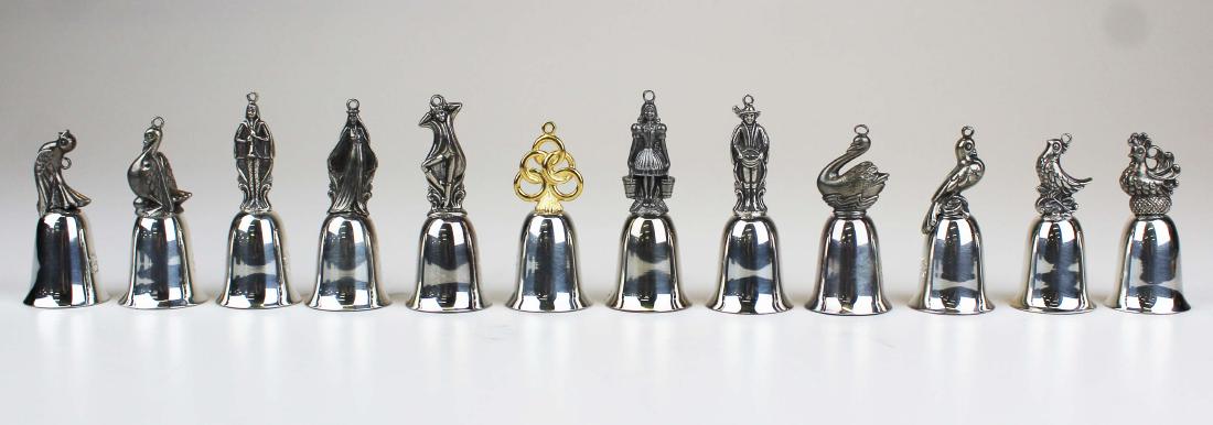 12 Reed & Barton Christmas bells: 12 Reed & Barton Christmas bells in their original boxes.