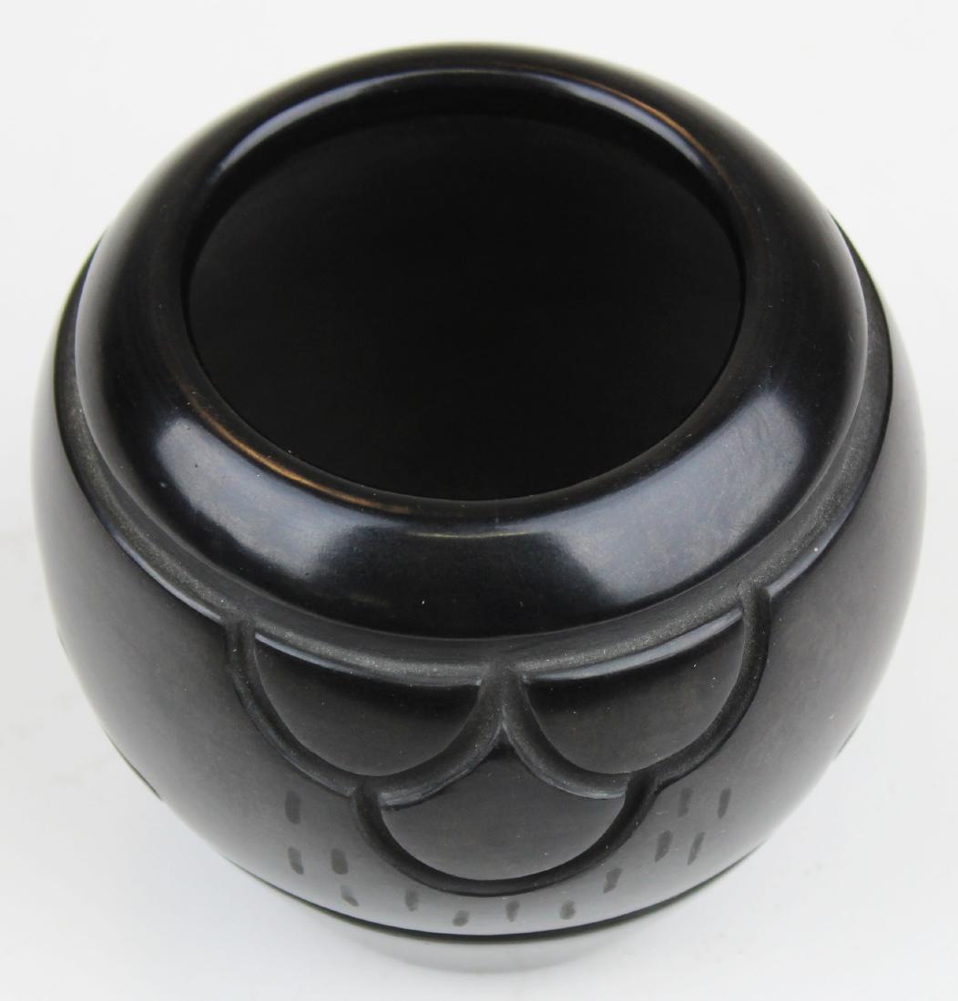 Cliff Roller Santa Clara incised jar: late 20th c Cliff Roller, Santa Clara Pueblo incised blackware jar, ht 3 1/2"