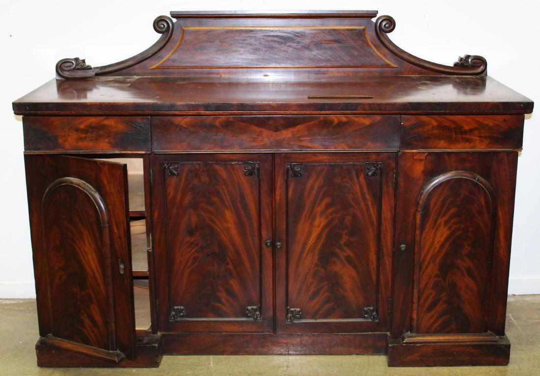 Victorian flame mahogany 4 door sideboard: ca. 1850 English Victorian flame mahogany veneered 2 part sideboard with carved pedimented back splash and 3 concealed drawers over 4 doors - some losses to molding trim 47" x 66.5" x 23"