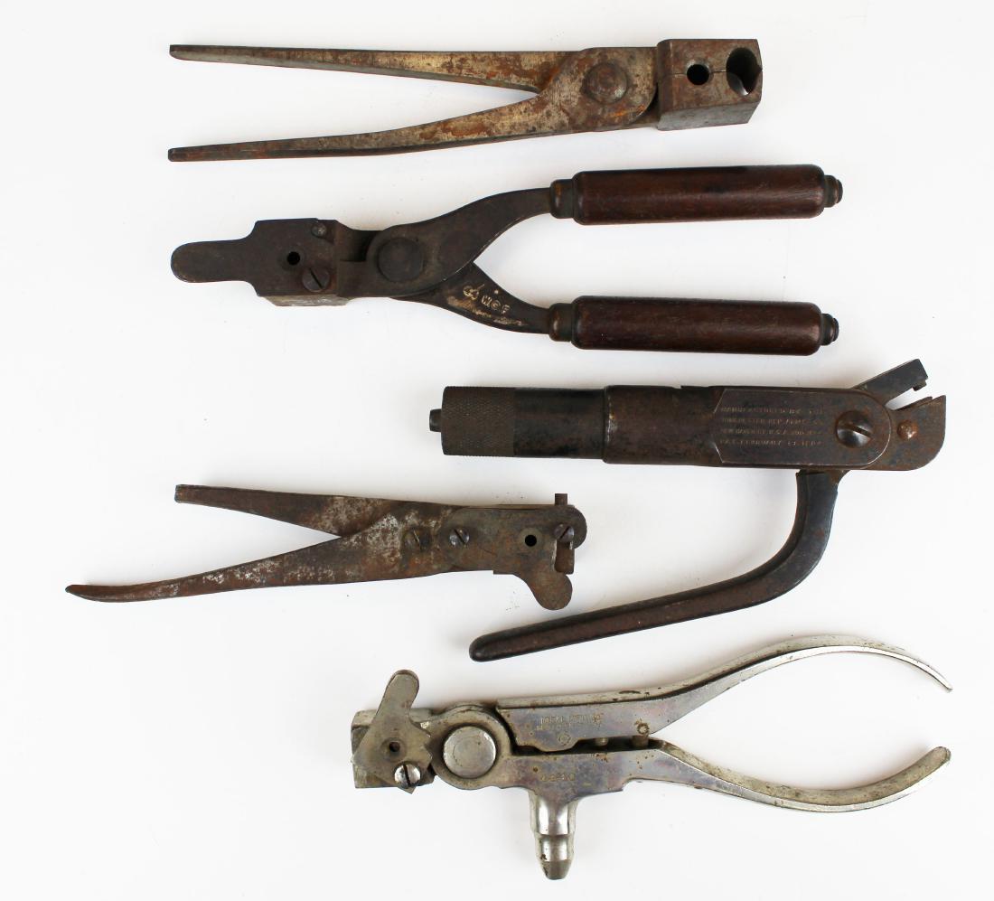 Lot of bullet loaders and molds: Lot of antique hand bullet loader and molds. Ideal 44-40 nickel chrome loader, WRA Co 32-40 loader Model 1894 Pat Feb 1894, 44 WCF mold, 54 cal mini ball mold and 45 cal mold with broken handle.