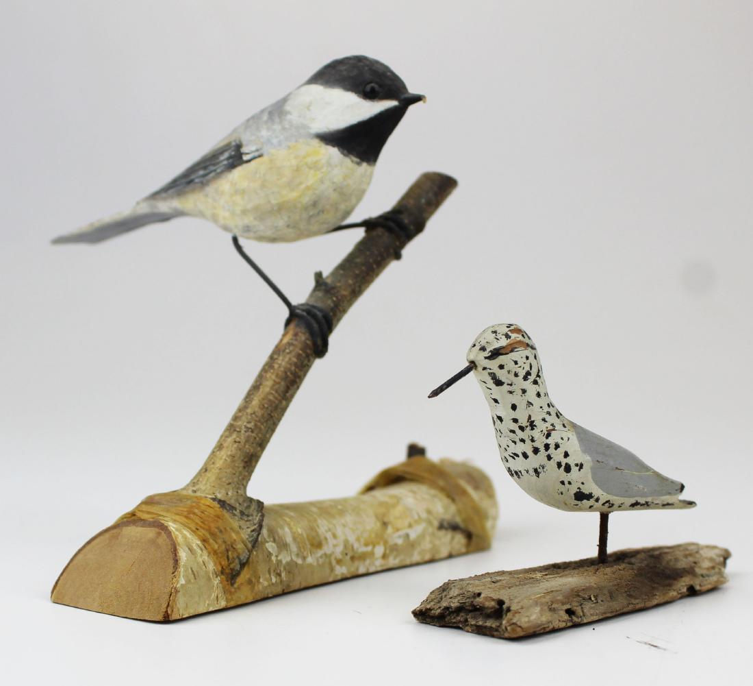 Signed Spear carving of a Chickadee: Paint decorated and carved Chickadee song bird on birch branch signed Spear Vermont. With smaller carved bird.