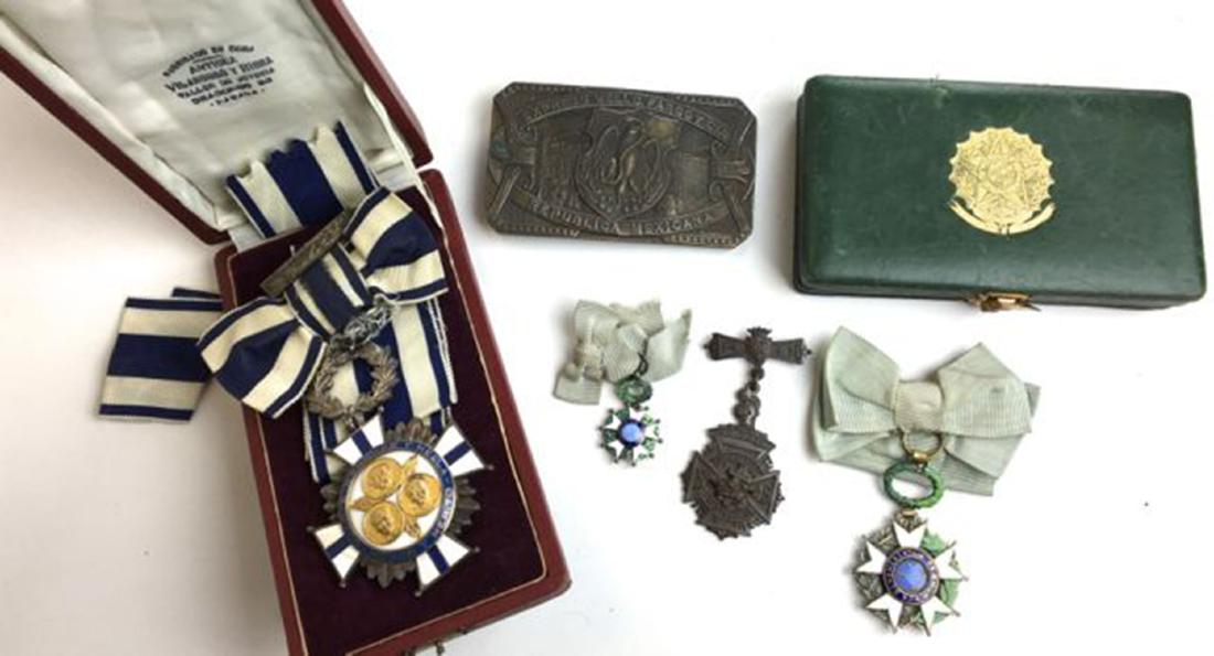 A group of medals: A group of medals including silver enamel Duarte Sanchez Y Mella Honor Y Merito, two Benemerentium Praemium Republica Estados Unidos Brazil, Express Wells Fargoy CIA Republic a Mexicana bronze belt bu