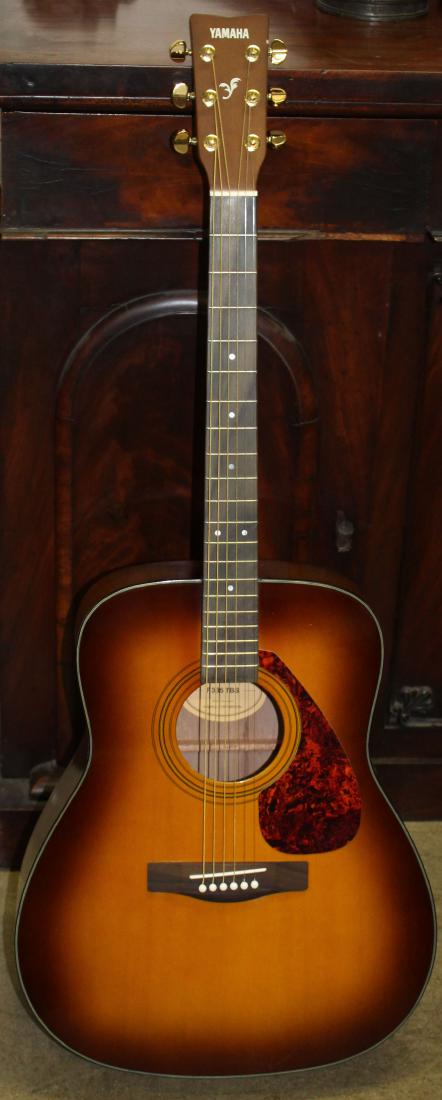 Yamaha F335 TBS: Yamaha F335 TBS - laminate top acoustic guitar with gig bag made in Indonesia; Dreadnaught sized. Nice low action.