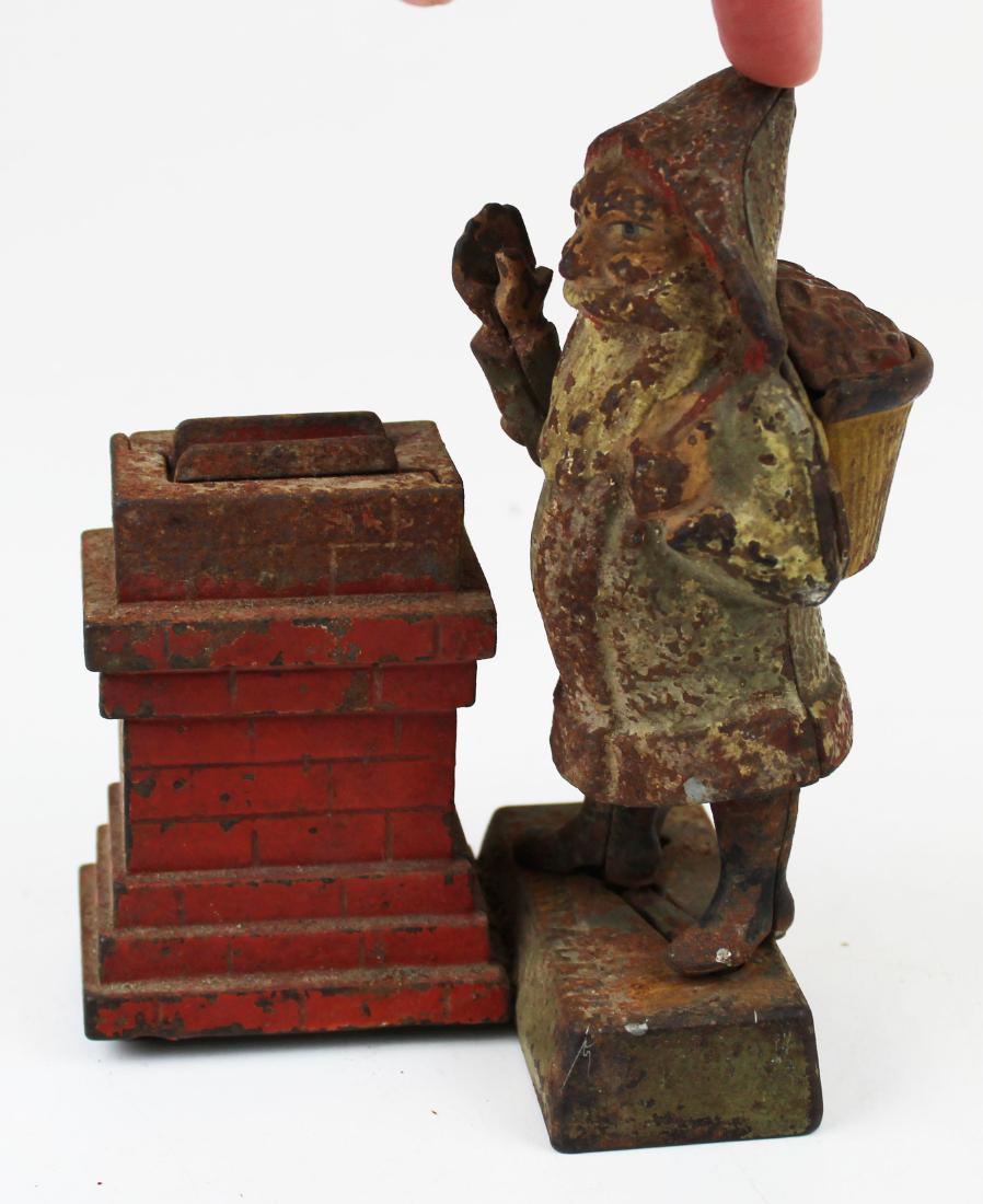 1889 Santa Claus cast iron mechanical bank: 1889 Shepard Hardware "Santa Claus at the Chimney" cast iron mechanical bank (base of Santa broken, piece is there), some paint remaining, ht 6"