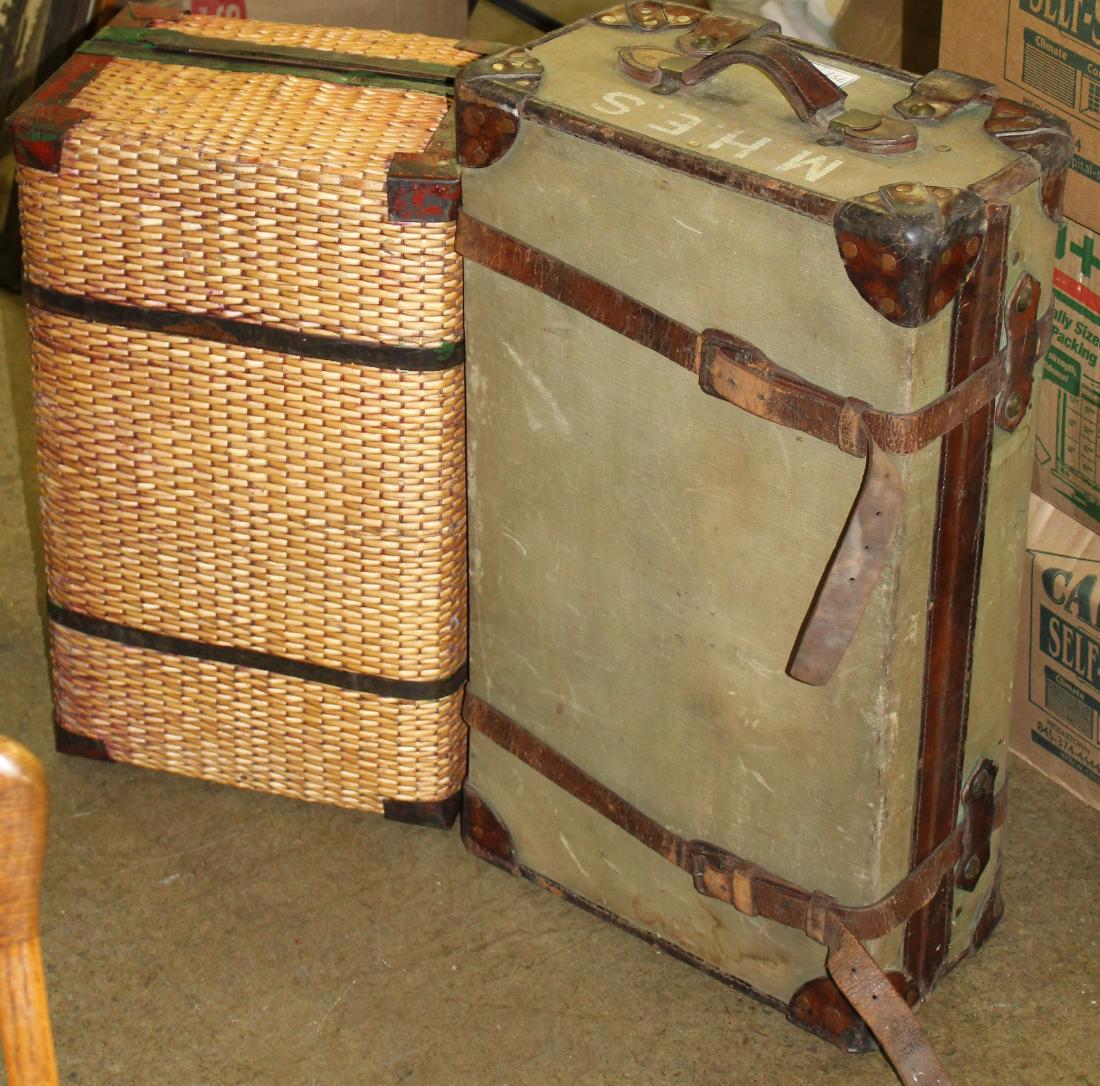 two ca. 1900 vintage travel suitcases: two ca. 1900 vintage travel suitcases including canvas covered leather case, and woven reed case 31" x 17" x 10", 16" x 26" x 11"