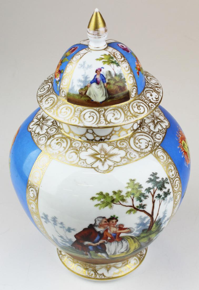 Dresden style scenic hand painted porcelain urn: early 20th c. Dresden style scenic hand painted porcelain ginger jar urn with pseudo Augustus Rex Meissen mark-some wear to knob on lid 14" x 7.5"