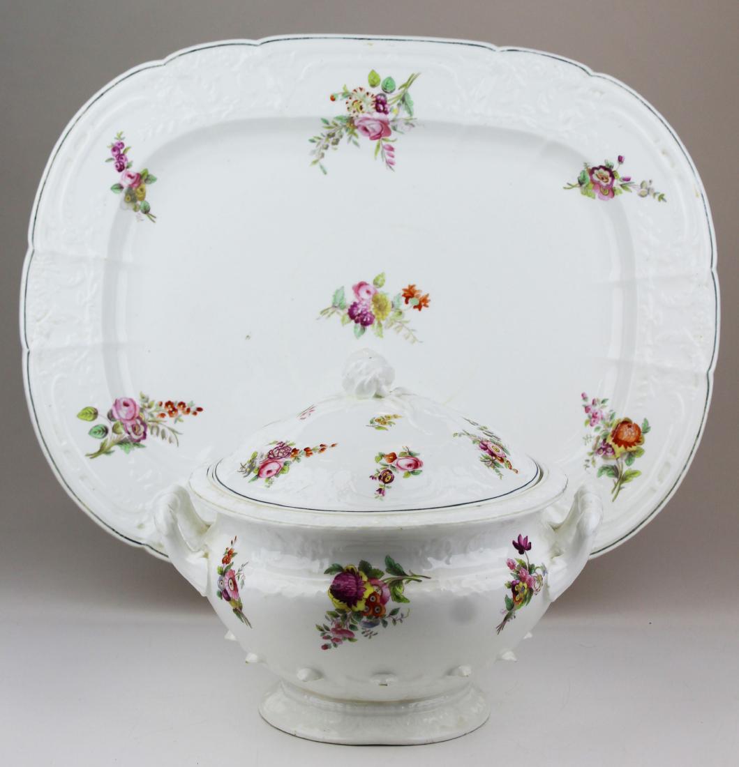 English Swansea porcelain tureen and platter: 19th c. English Swansea style porcelain tureen and platter with transfer and hand painted floral spray decoration, tureen lid and platter with small hairline checks 10.5" x 11.5", 21"x 16.5"