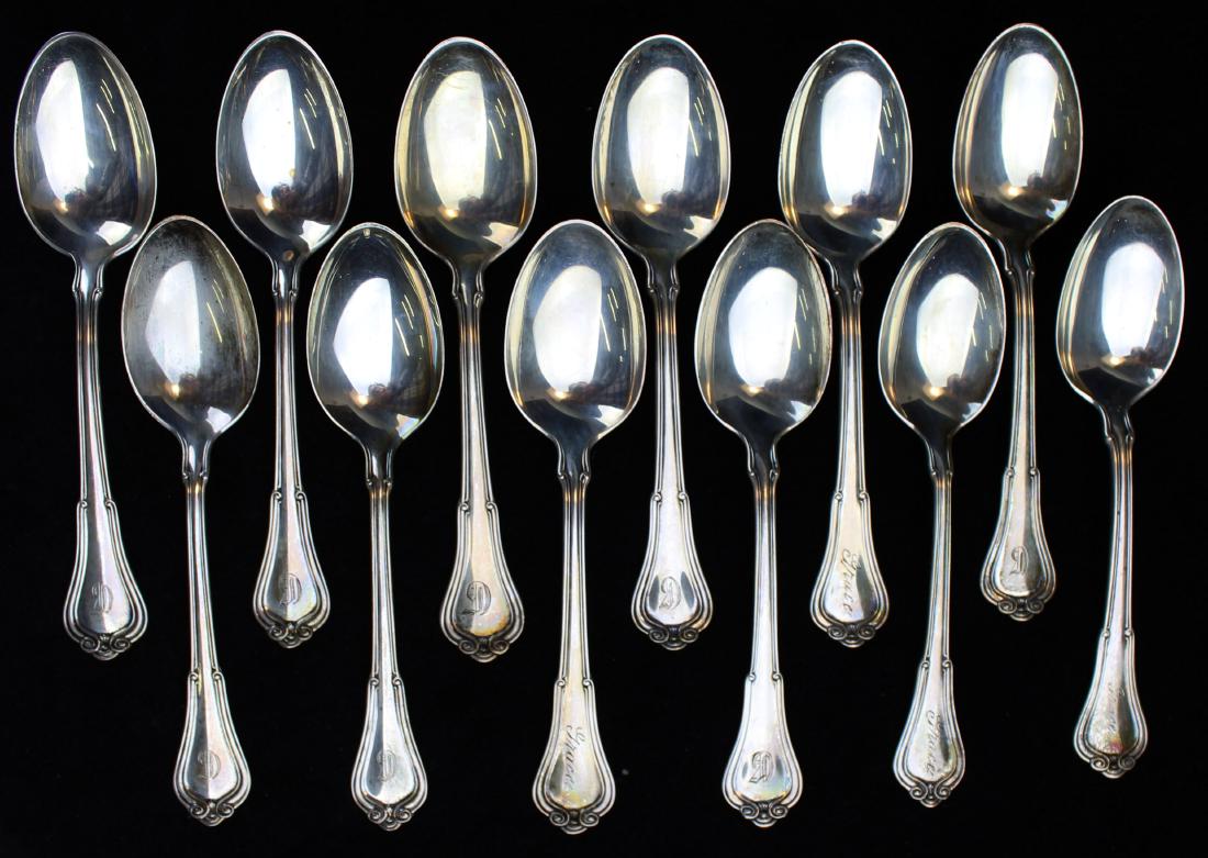 12 Gorham Norfolk sterling silver teaspoons: set of 12 Gorham "Norfolk" pattern sterling silver teaspoons, each hand engraved with a Gothic script "G" monogram, or "Grace", and a date on the reverse for the years 1907-1918 5.5" 9.3 troy oz.