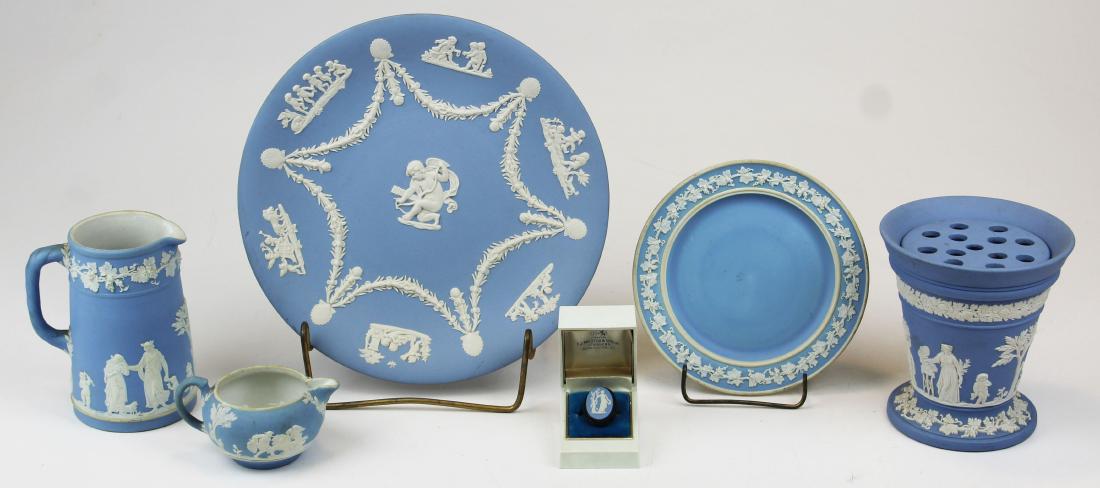 6 pcs. Wedgwood pale blue Jasperware: 6 pcs. Wedgwood pale blue Jasperware including dipped Trojan jug, dipped trivet, dipped creamer, solid blue plate, solid vase with frog, and solid medallion ring in sterling setting 2" x 4.75"