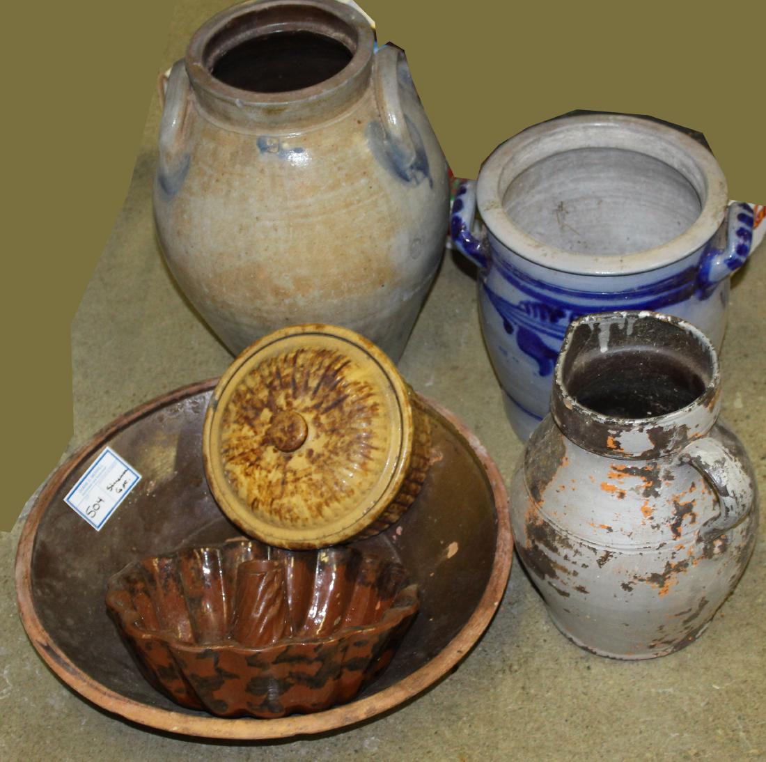 6 piece of 18th & 19th c stoneware: A group of 6 pieces of 18th c and 19th c stoneware including an 18thc ovoid stoneware crock with blue decoration (cracks), a Pennsylvania blue decorated crock (cracks), a early redware milk pan (losse