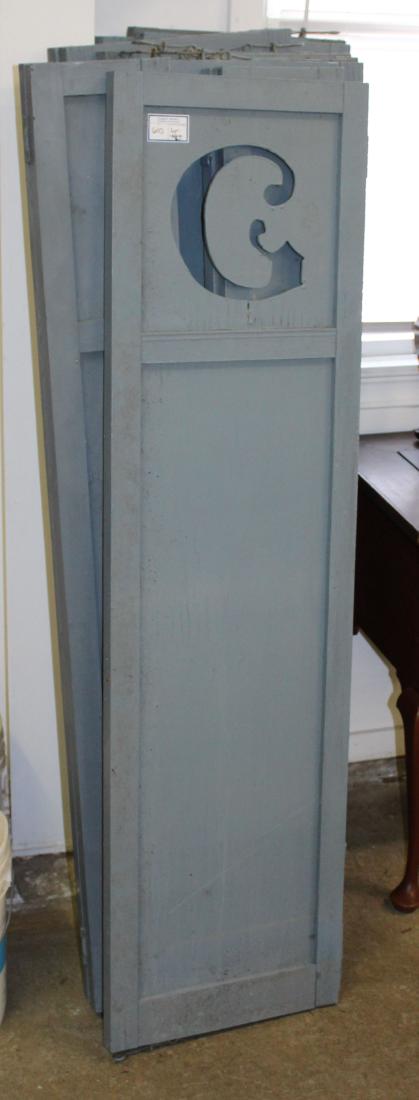 6 pair of Arts & Crafts shutters: 6 Pair of Arts & Crafts shutters with gothic type font "C" 16" x 58" each side. One shutter with bottom edge rot.