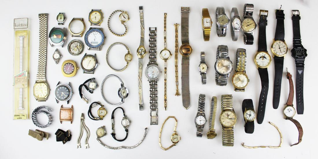 20 plus wrist watches: A grouping of more than 20 men's and ladies wrist watches inc. 2 Longines, Bulova, Nautica, Timex,Swiss